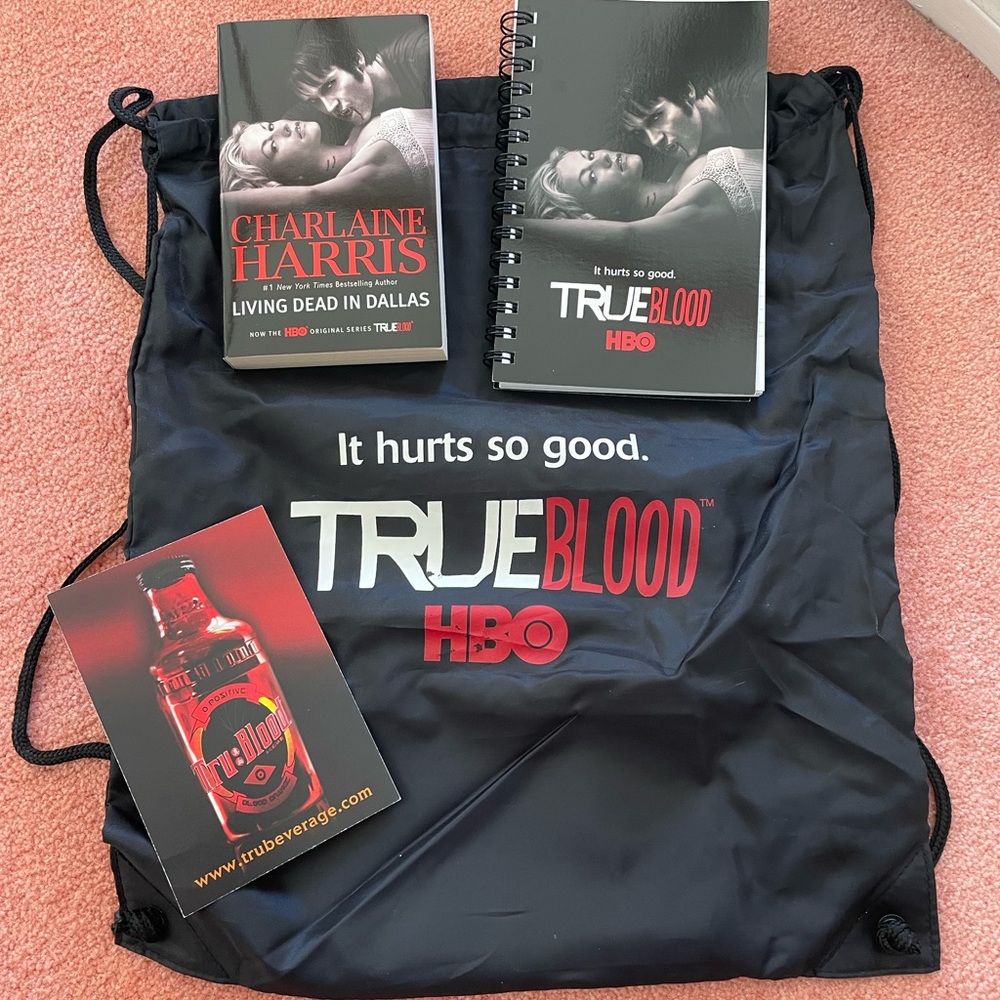 True Blood HBO Drawstring Bag, book, and notebook